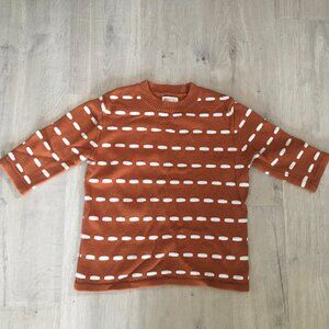 Unique orange sweater